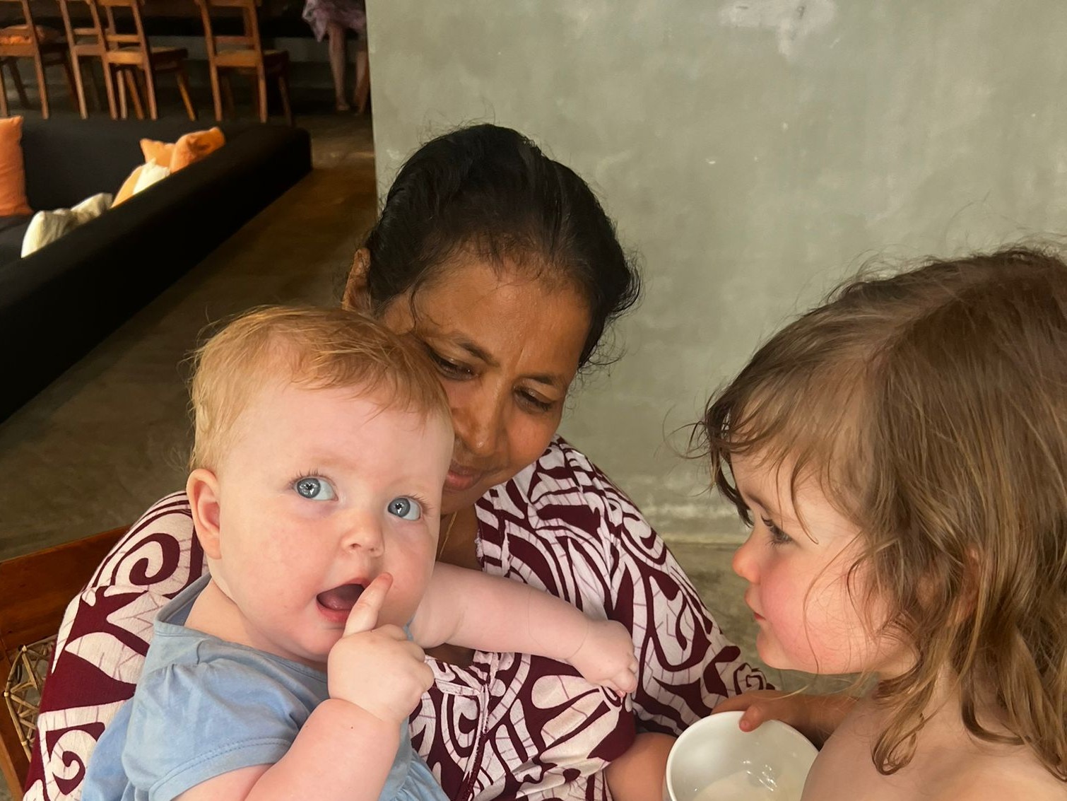 Nanny caring for a baby at home